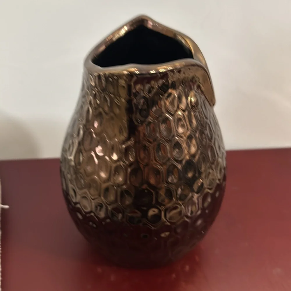 Copper/Bronze colored ceramic owl vase with a dimpled, metallic finish